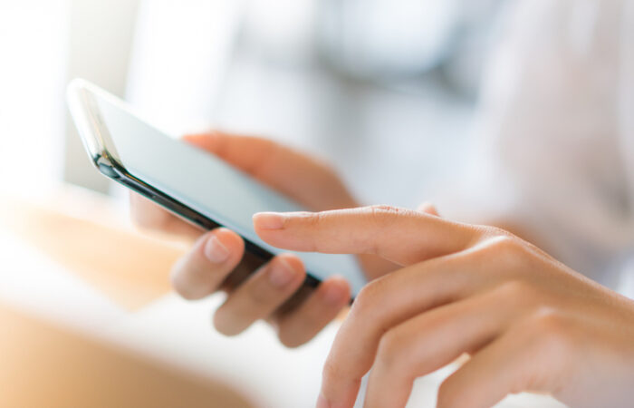 a person using a mobile phone