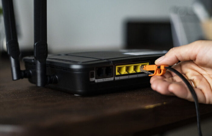 a person fixing an internet outages